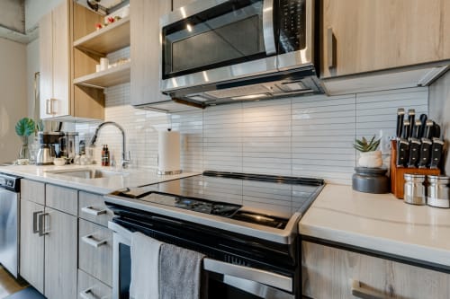 Your modern kitchen awaits with sleek stainless steel appliances, ample counter space, and everything needed for culinary adventures during your stay.
